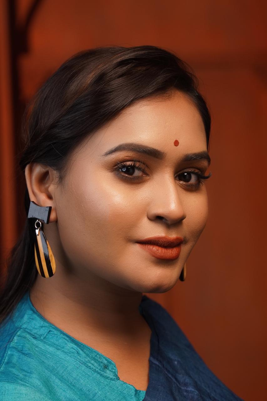 Kairavi Wooden Earrings – Ebony Bow & Striped Teardrop Danglers - Chandrakalakriti