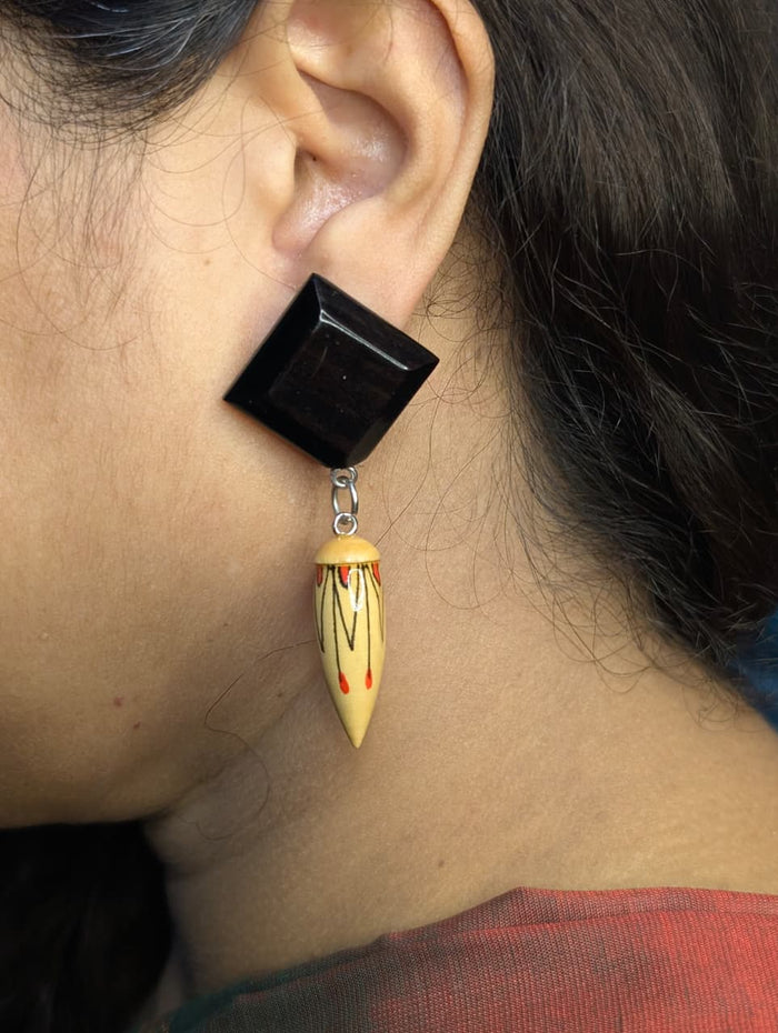 Taruja hand-painted red and black wooden dangle earrings in Maple and Ebony